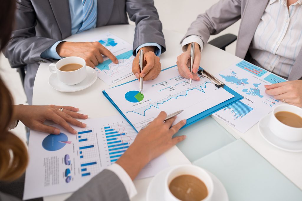 Business people discussing financial data